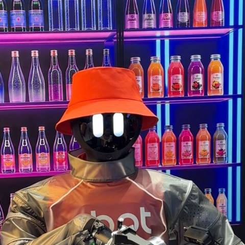 Robot bartender pouring a drink